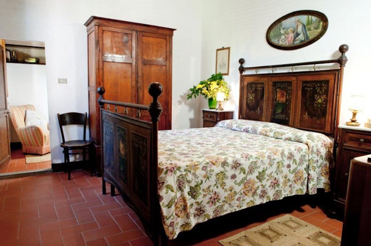 Family antiques are used in the villa decor at Tenuta Bossi