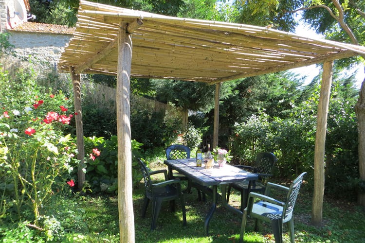 A private gazebo with table and chairs