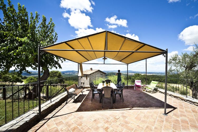Every apartment has a covered eating area at Podere Ripostena