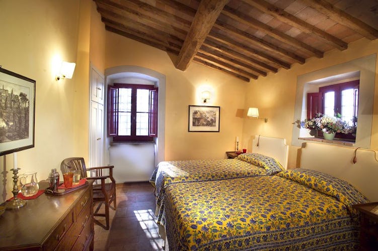 Spacious bedrooms with lots of natural light at Chianti Suites