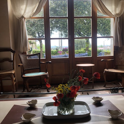 The ground floor has many windows onto the courtyard and gardens