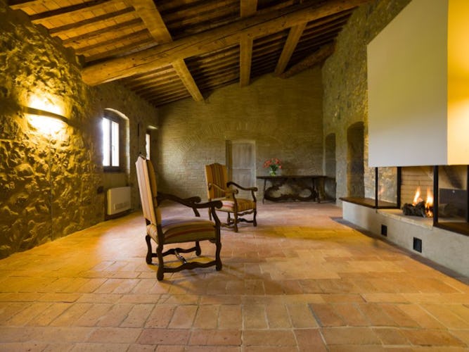 Living room with fireplace Poderi Firenze