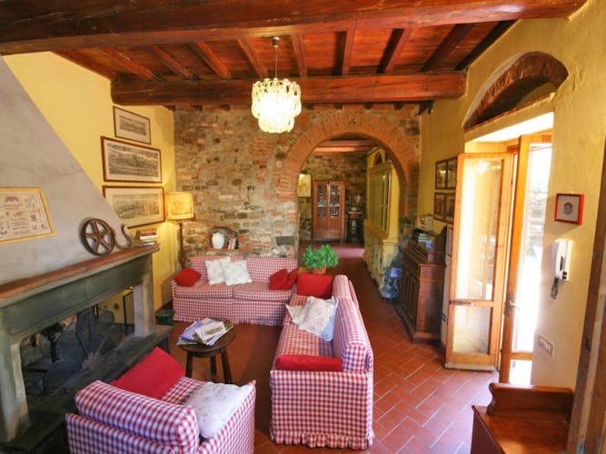 Wooden beamed ceilings, stone fireplaces & walls at Villa Cafaggiolo