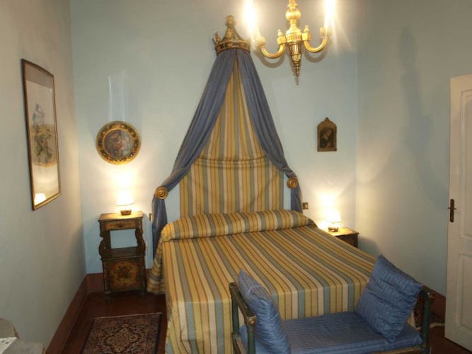 Bedrooms are decorated in style at Villa il Poggio