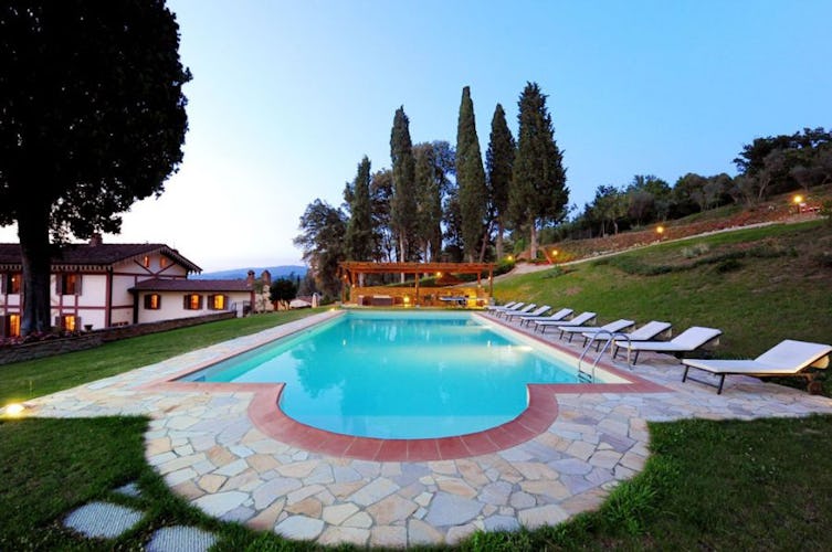 Private pool with lush green park area at Villa Rossi-Mattei