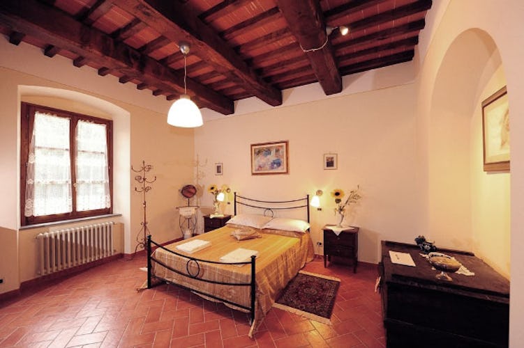 The bedrooms have classic Tuscan accents and WiFi access.