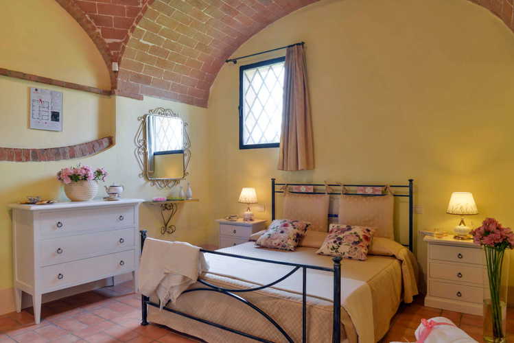 Agriturismo San Fabiano - Camera da letto de Le Tortore
