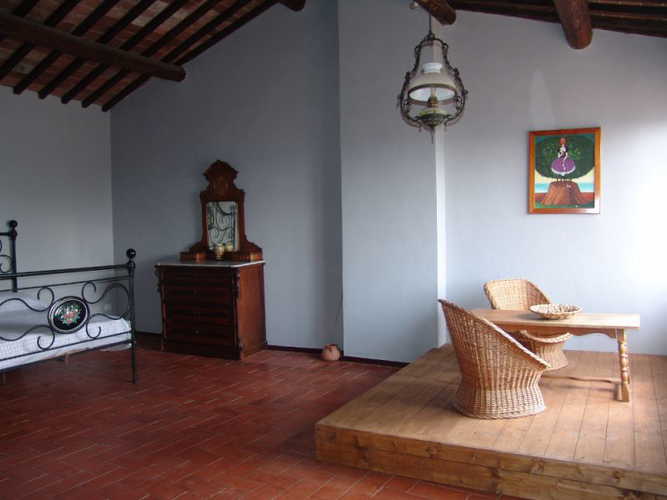 Bedroom decorated with blue colours and original details