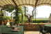 The veranda in the garden offers shade when necessary