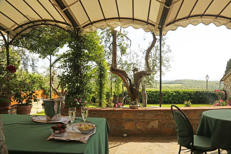 The veranda in the garden offers shade when necessary