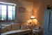 Traditional wood beam ceilings , wrought iron furnishing & soft colors