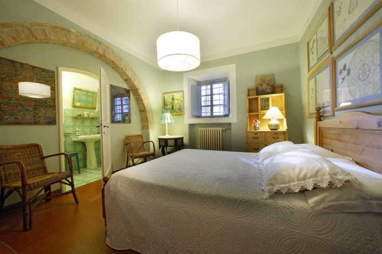 Nary's bedroom is on the ground floor of Candida's Chianti House