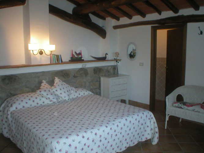 Camera in stile rustico del Casale Bozzo