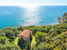 The villa with its garden and private access to the beach