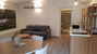 Cocoplaces Apartments - Il soggiorno con condizionatore