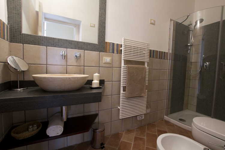 Bathrooms are all modernly and stylishly furnished