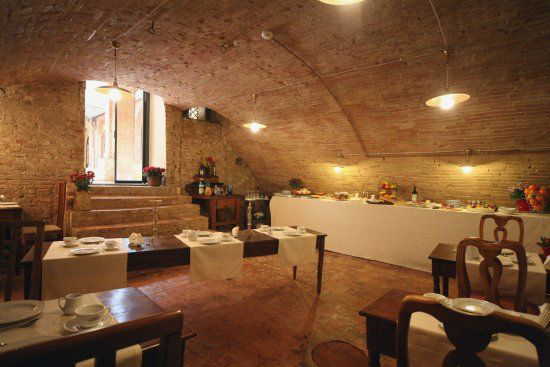 The antique cellar with the breakfast buffet  at il Chiostro del Carmi
