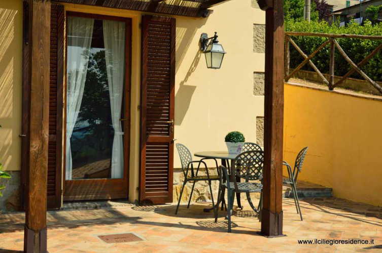 Enjoy meals outside in the fresh air at Il Ciliegio Residence