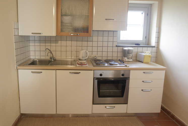 La Certaldina vacation apartments include internet and full kitchens with oven