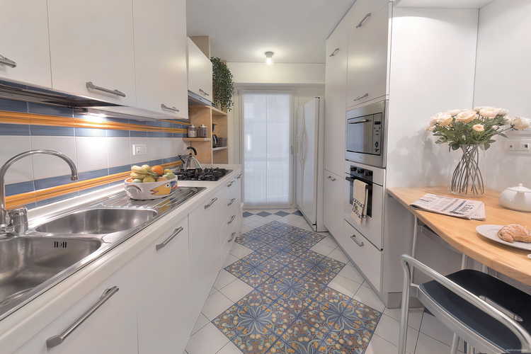 Old Bridge Apartment: la cucina Ã¨ dotata di ogni accessorio moderno, come la lavastoviglie, il forno ed il microonde
