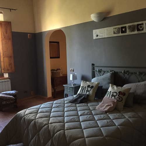 Podere Raffaello - Un'accogliente camera da letto
