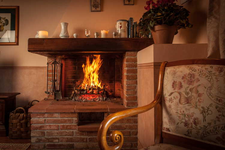 Residence Il Gavillaccio - il camino negli appartamenti vacanza