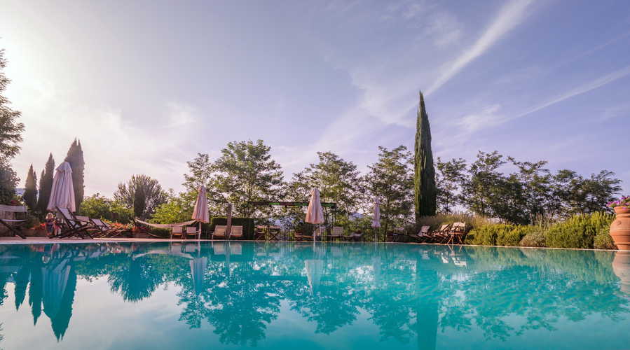 Residence Il Gavillaccio - il paesaggio include i tipici cipressi e olivi