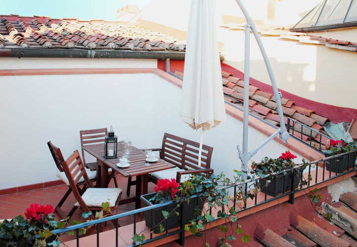 The exclusive terrace of Attico for enjoying al fresco meals