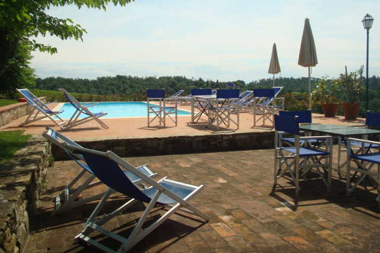 The fresh water pool overlooks the family run vineyards at San Vito