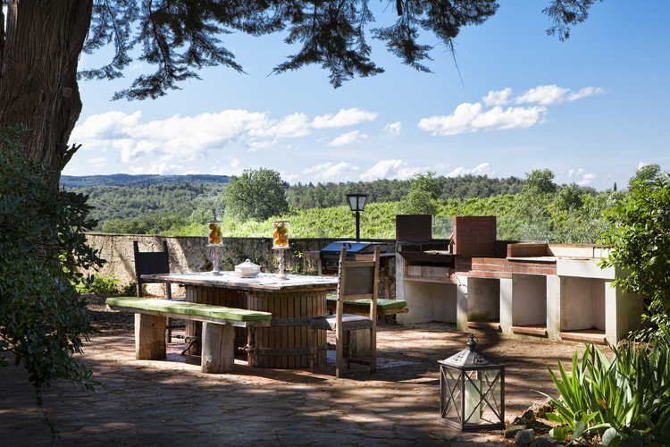 Picnic tables and BBQ grill invite you to eat outdoors