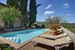 Deluxe swiming pool with loungre chairs at Villa Stolli