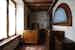 Camera con letti singoli arredata in stile Toscano