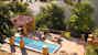 An inviting swimming pool is perfect for sun and relax An inviting swimming pool is perfect for sun and relax