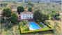 Aerial view of garden, pool and villa