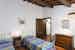 A room with two single beds in the Cortona apartment, with bright natural light A room with two single beds in the Cortona apartment, with bright natural light