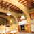 Brick arches and wooden beams accent the original architecture