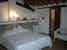 Rustic and stylish double bedroom of Casale Bozzo