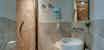 Travertine tile & full en suite bathrooms in every room at Frances B&B