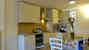 Fully equipped kitchen including oven and dishwasher