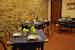 Lunantica Podere Il Falco - il ristorante in loco, un ambiente in stile rustico dalle pareti in pietra a vista