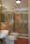 The living room of the Attico apartment with wooden beam ceiling