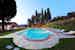 Private pool with lush green park area at Villa Rossi-Mattei